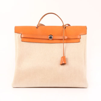 Front image of travel bag hermès herbag ecru canvas natural leather