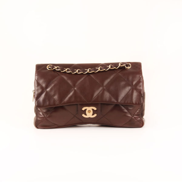 Front image of chanel maxi quilted brown bag