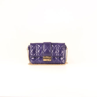 Front image of dior promenade purple patent bag