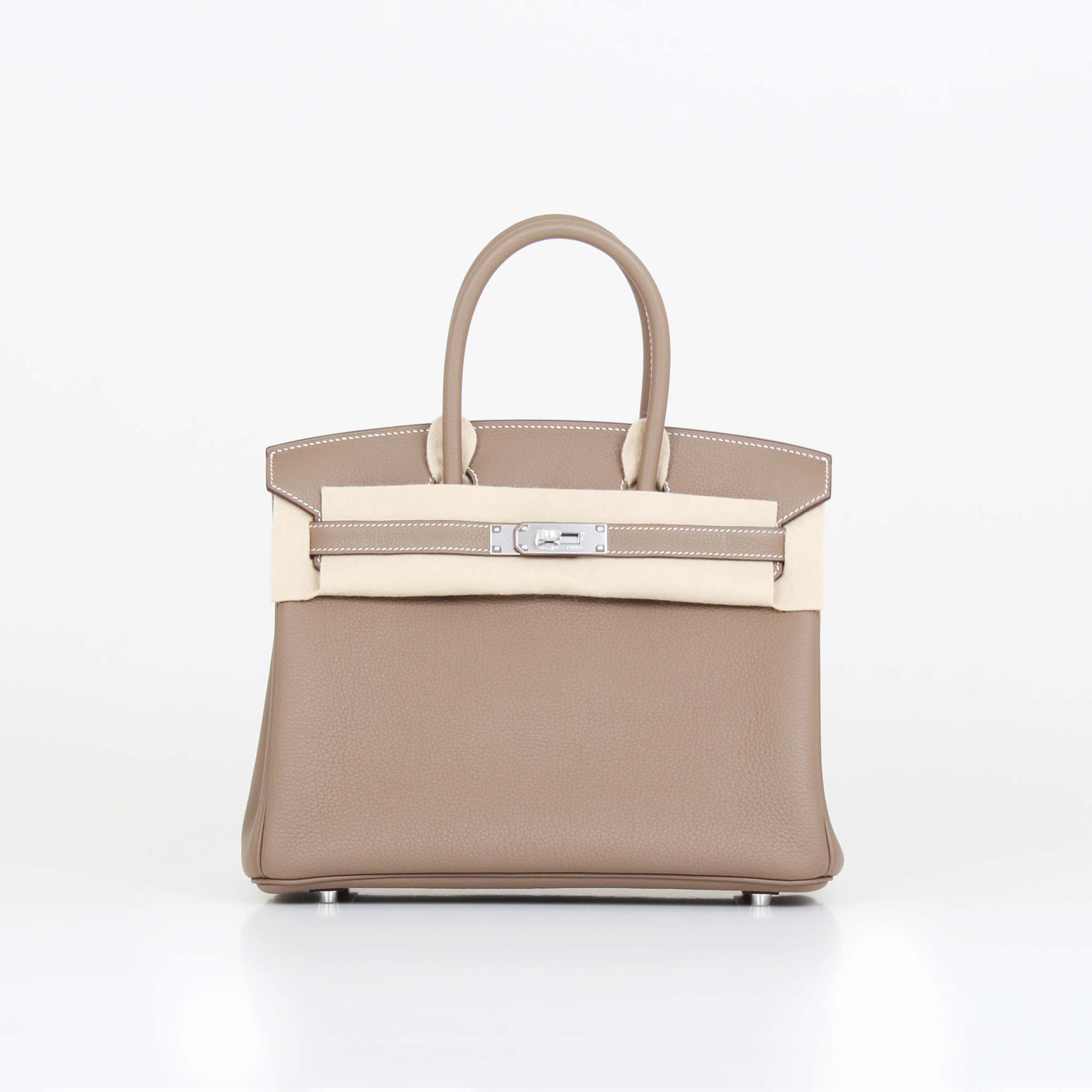Front image of hermes birkin bag taupe togo with protective cloth