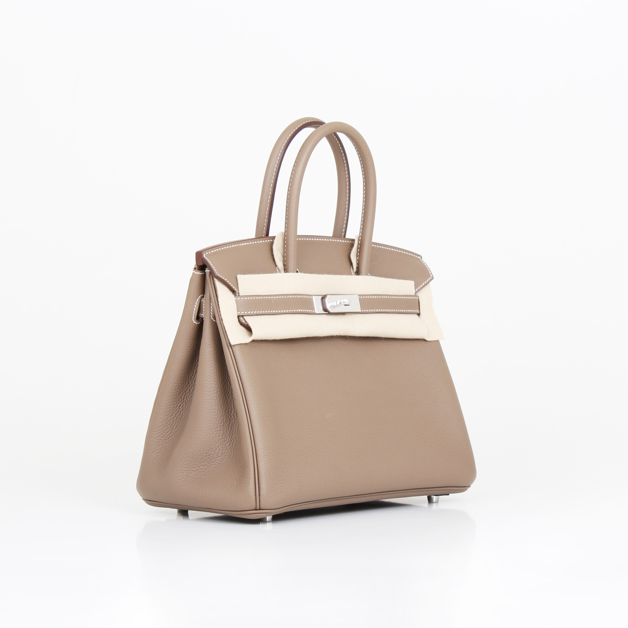 General image of hermes birkin bag taupe togo with protective cloth